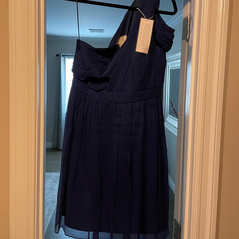 Blue knee length dress. Perfect for a wedding guest.